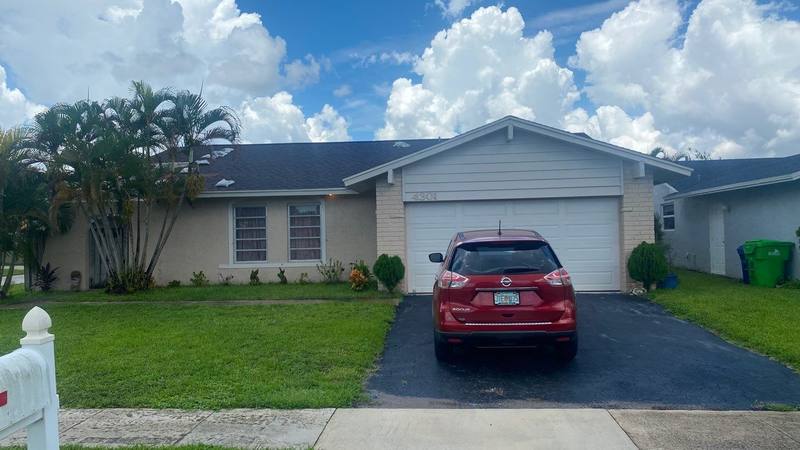 residential roof replacement by Hloska Roofing in Sunrise