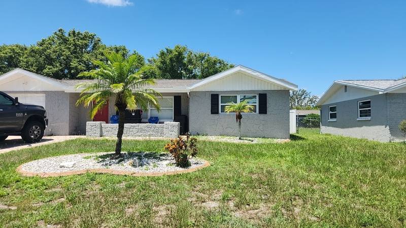 residential roof replacement by Hloska Roofing in Port Richey