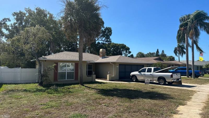 residential roof replacement by Hloska Roofing in Port Richey