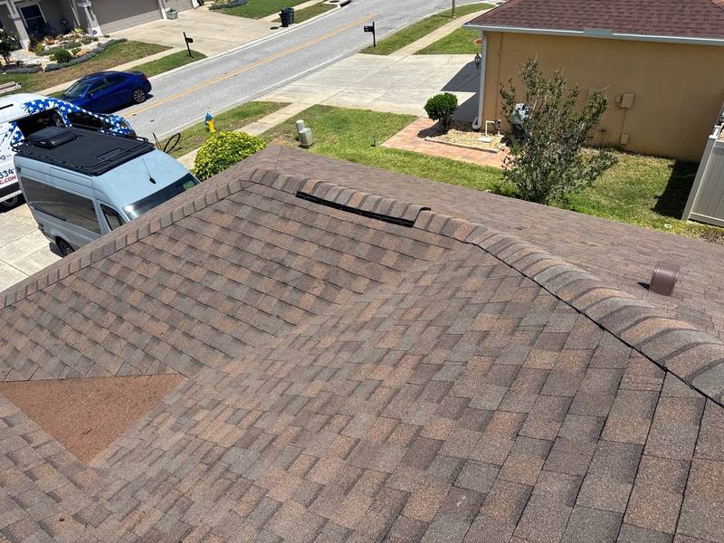 residential roof repair by Hloska Roofing in Holiday