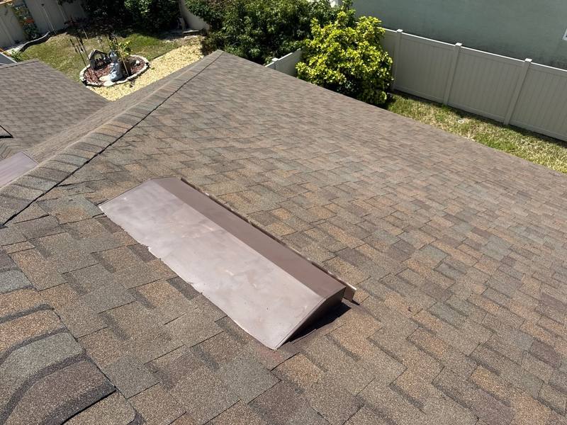residential roof repair by Hloska Roofing in Holiday