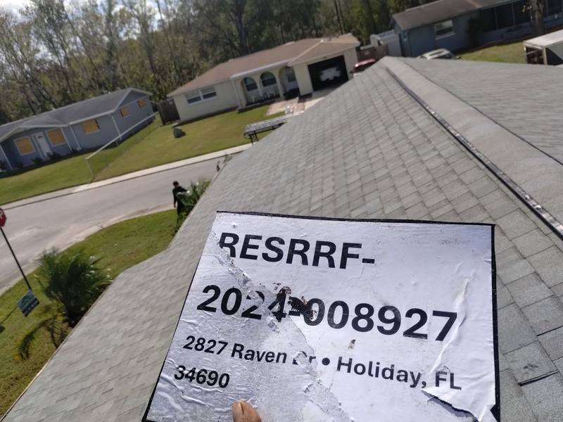 residential shingle roof replacement by Hloska Roofing in Holiday