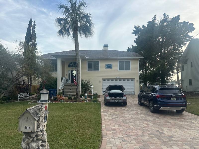 residential roof replacement by Hloska Roofing in Port Richey