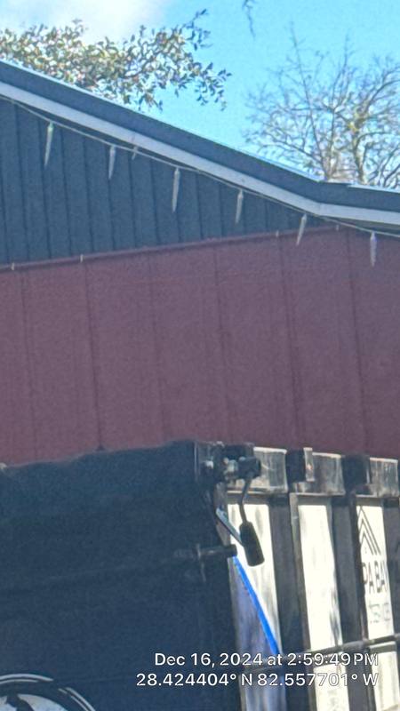 residential metal roof replacement by Hloska Roofing in Spring Hill