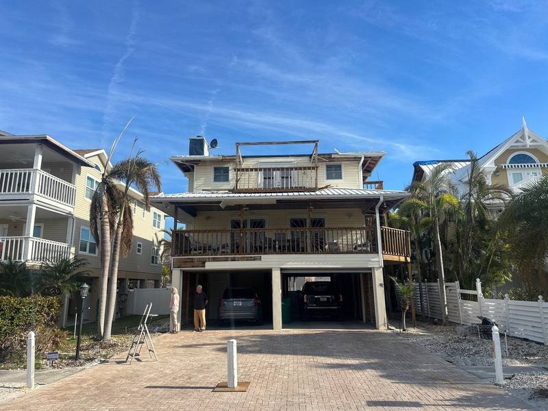 residential metal roof replacement by Hloska Roofing in Anna Maria