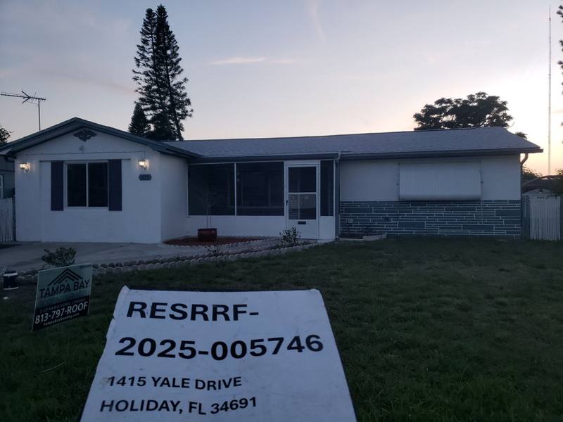residential shingle roof replacement by Hloska Roofing in Holiday