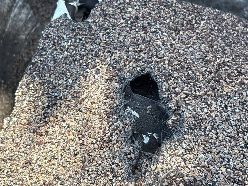 residential roof repair by Hloska Roofing in Spring Hill